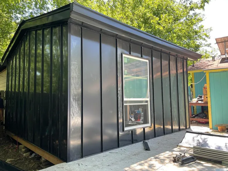 Black standing seam metal wall panels for Roof Inspection in San Diego