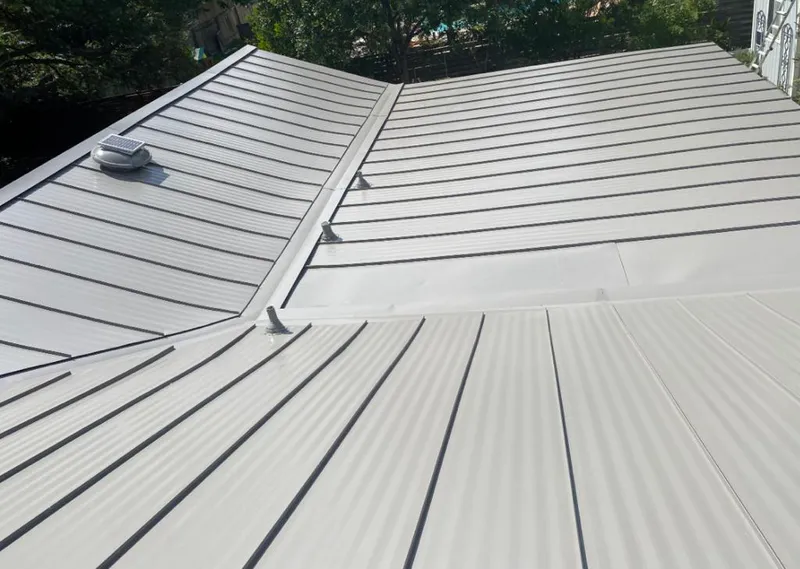 Solar attic fan installed on a metal roof for Roof Ventilation in San Diego